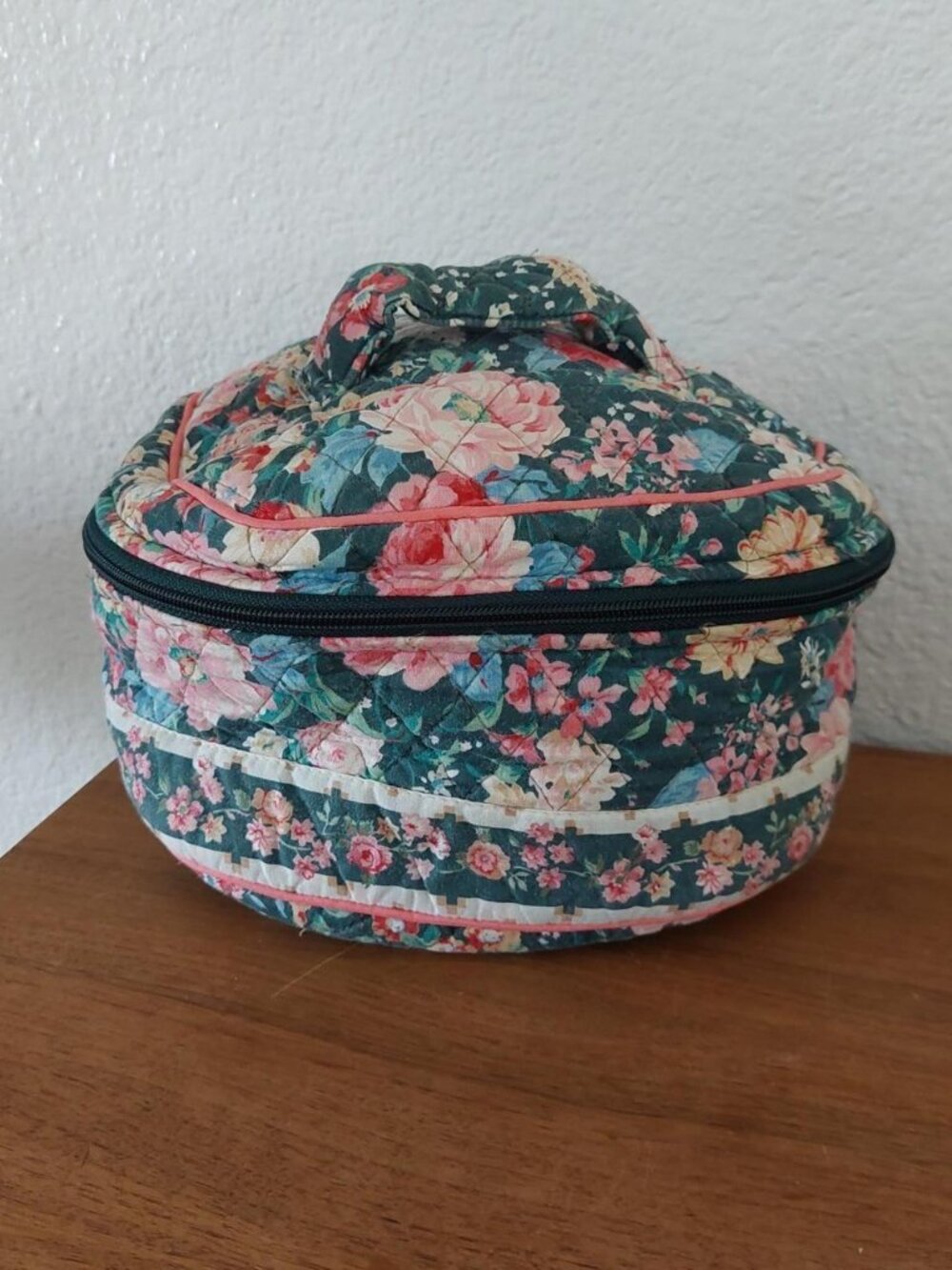 Vera Bradley 90s Spring time floral toiletry bag with pink and red flowers on a